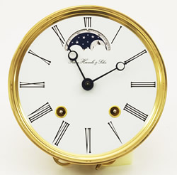 Dial 01: White Dial 165mm with brass rim and moon phase indication.