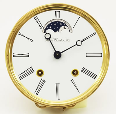 Dial 01: White Dial 165mm with brass rim and moon phase indication.
